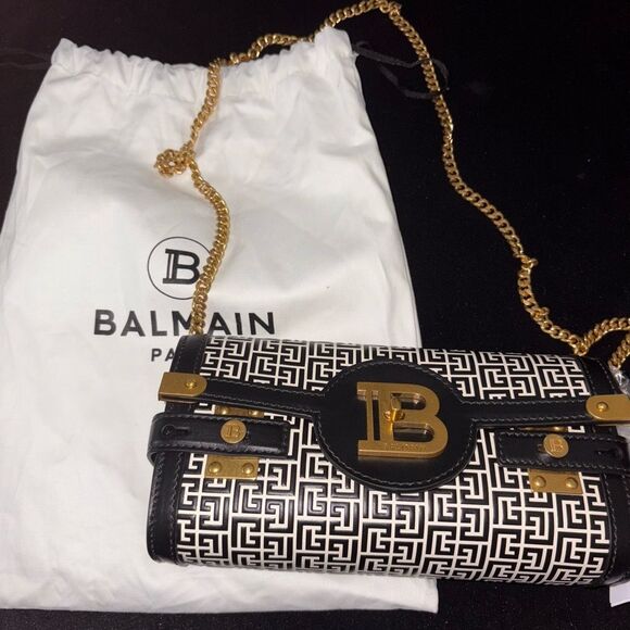 Brand new with dustbag Balmain clutch bag / crossbody Black and Gold Women's Bag